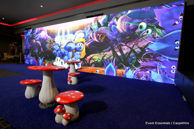 Internally lit 9-metre-wide media wall, blue astro turf and custom theming