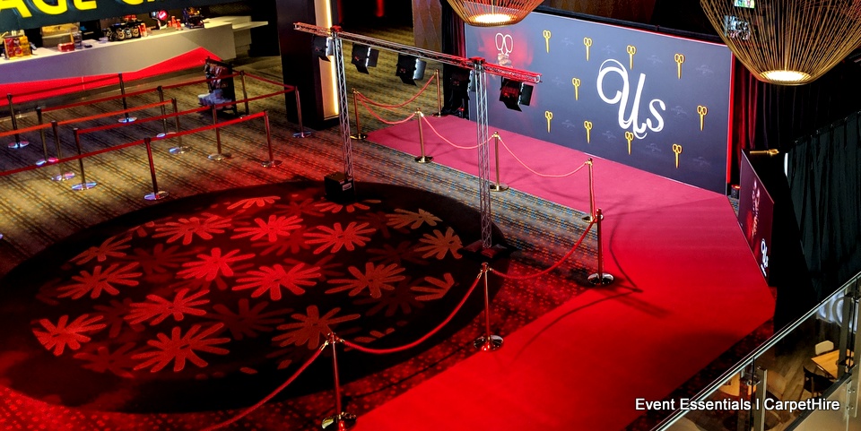 Burgundy Carpet and media wall hire